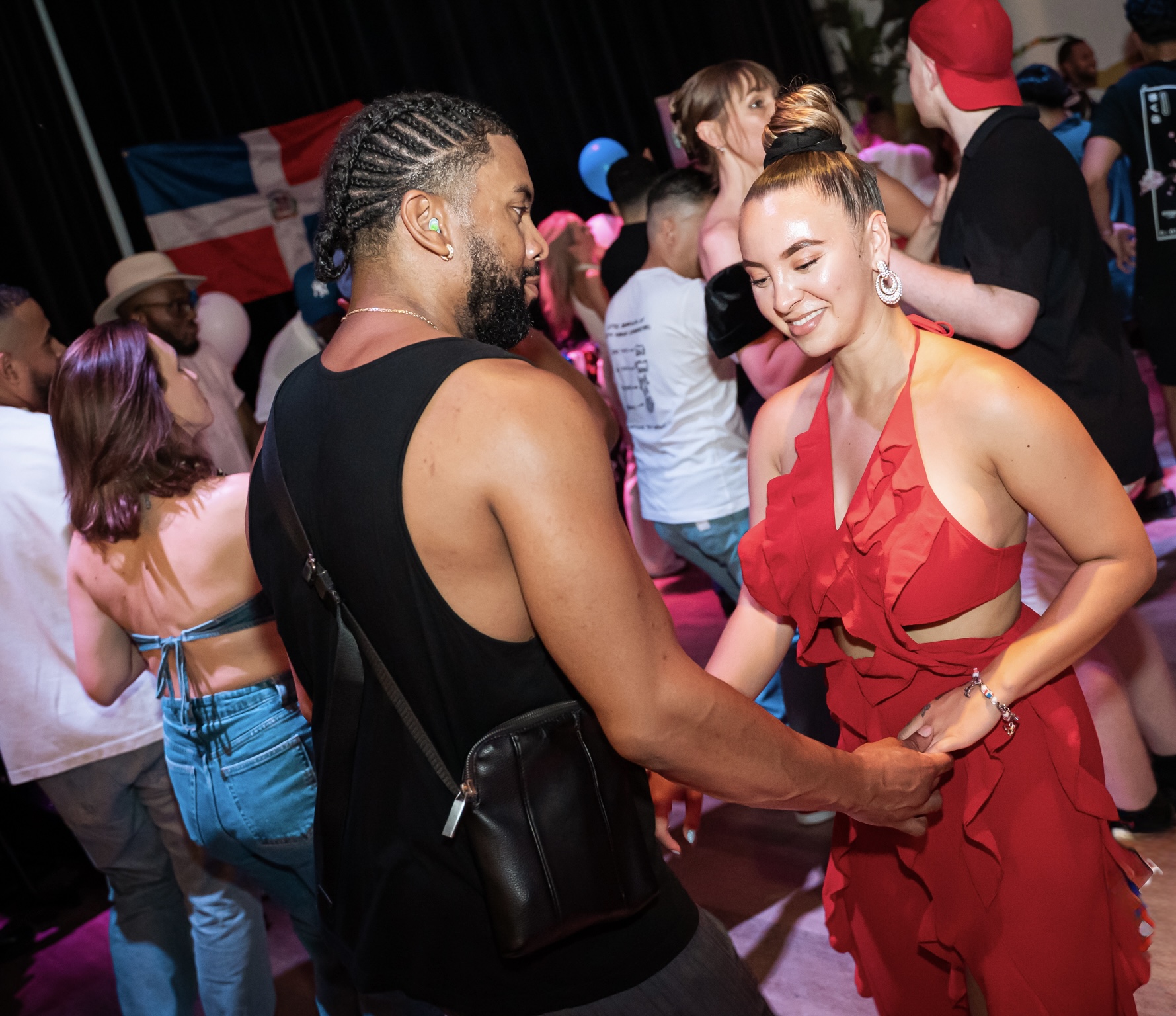 Dancers connecting at a Playtime Dominican Bachata social night in Amsterdam