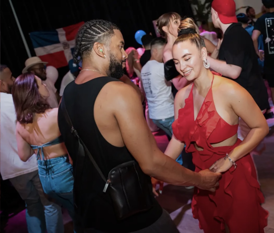 Dancers connecting at a Playtime Dominican Bachata social night in Amsterdam
